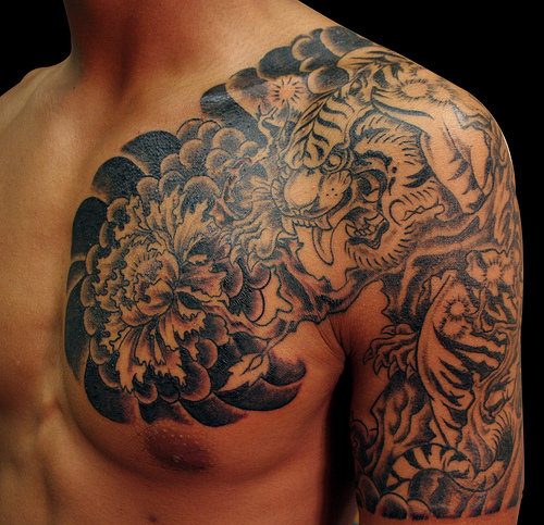 Grey Japanese Tiger Tattoo On Man Chest