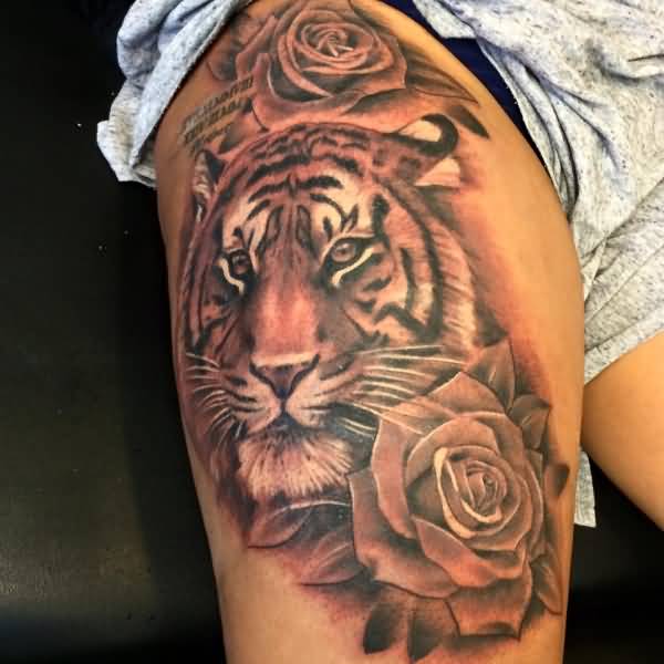 Grey Rose Flower And Tiger Head Tattoo On Thigh