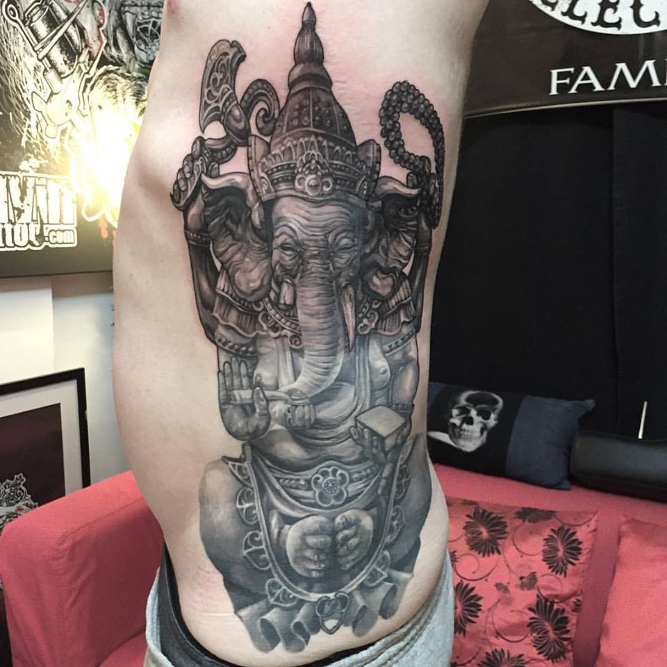 Impressive Lord Ganesha Tattoo On Man Left Side Rib
