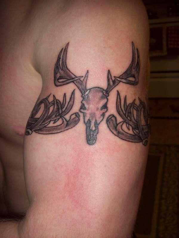Left Bicep Deer Skull Tattoo For Men