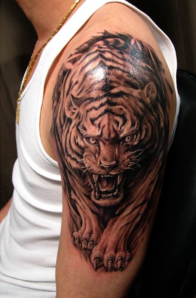 Man Left Shoulder Walking Tiger Tattoo