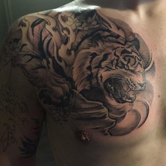 Man With Grey Ink Japanese Tiger Tattoo On Chest