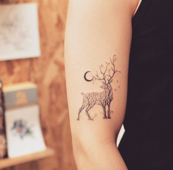 Moon And Deer Tattoo On Right Bicep For Women