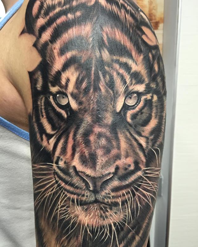 Nice Black And Grey Tiger Tattoo