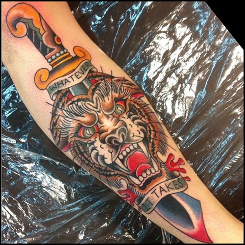 Nice Dagger And Tiger Tattoo On Arm