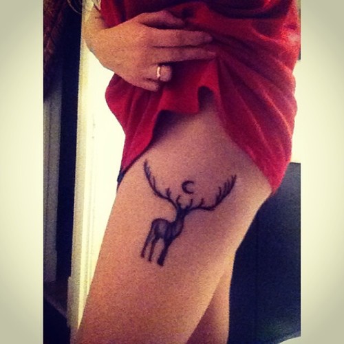 Nice Deer Tattoo On Side Thigh