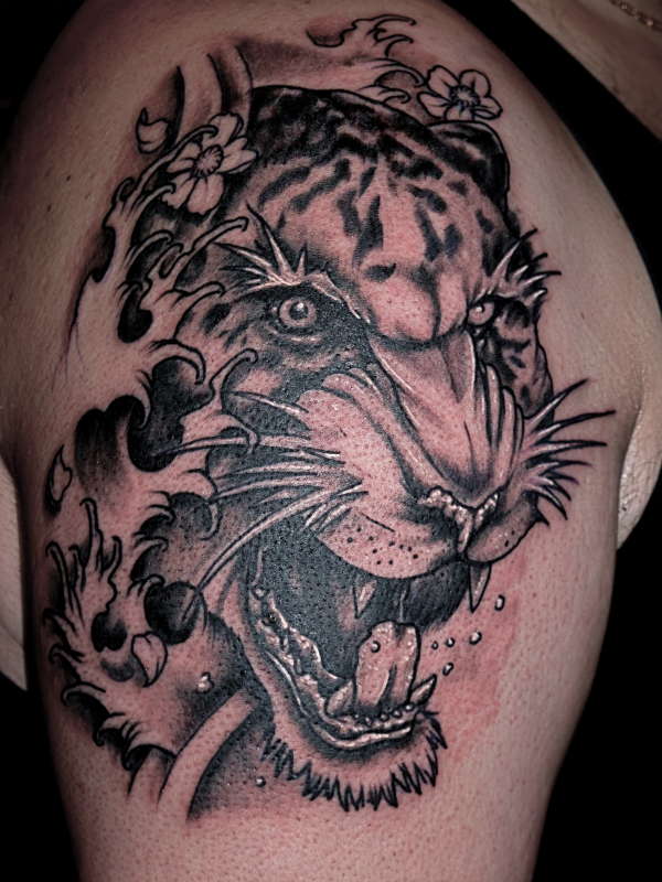 Nice Flowers And Tiger Head Tattoo On Shoulder