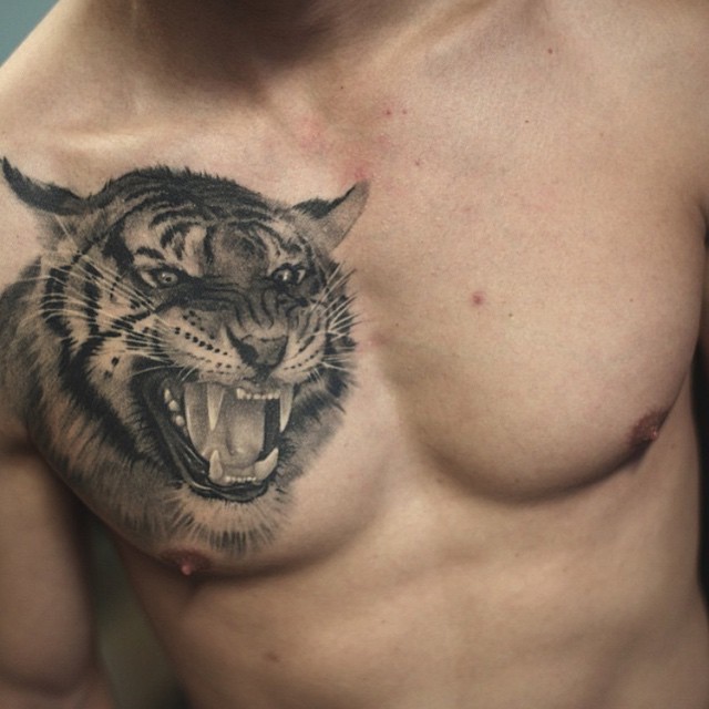 Nice Grey Ink Tiger Tattoo On Chest