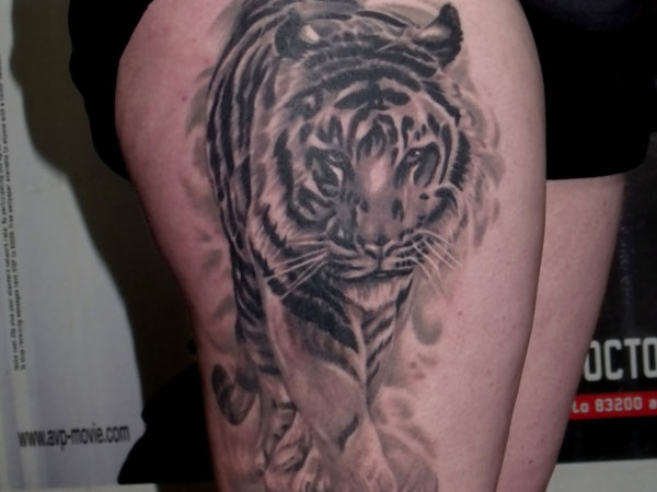 Nice Grey Tiger Tattoo On Girl Thigh