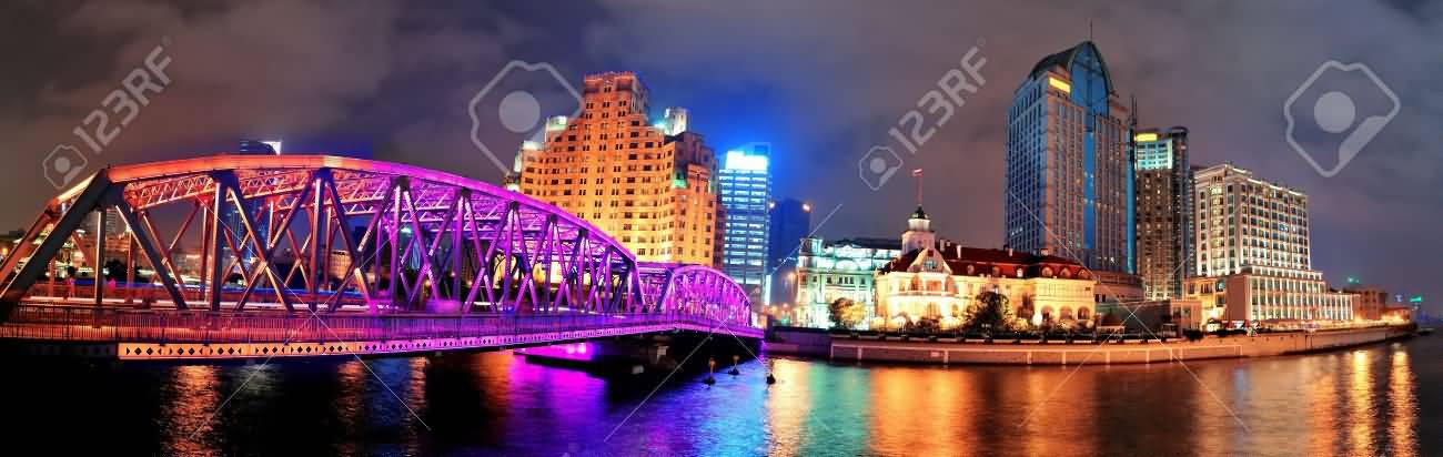 Panorama View Of The Waibaidu Bridge At Night With Colorful Lights Over River