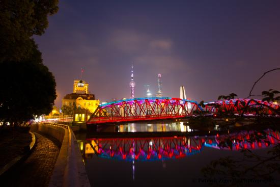 Pink And Blue Lights Over The Waibaidu Bridge