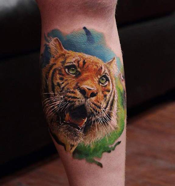 Realistic Colorful Tiger Face Tattoo On Leg