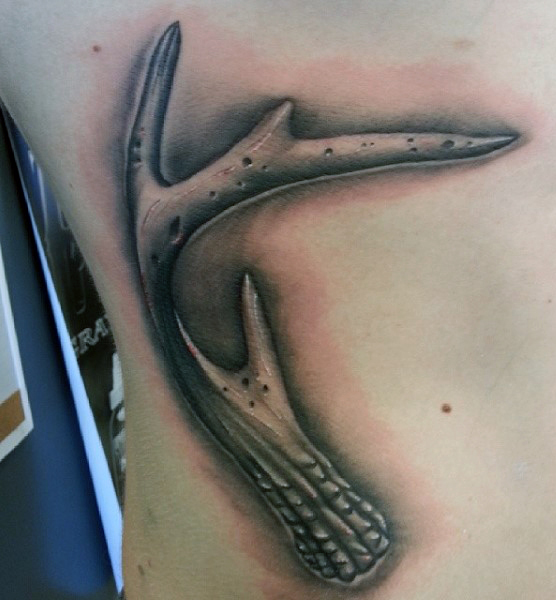 Realistic Grey Ink Deer Antler Tattoo On Side Rib