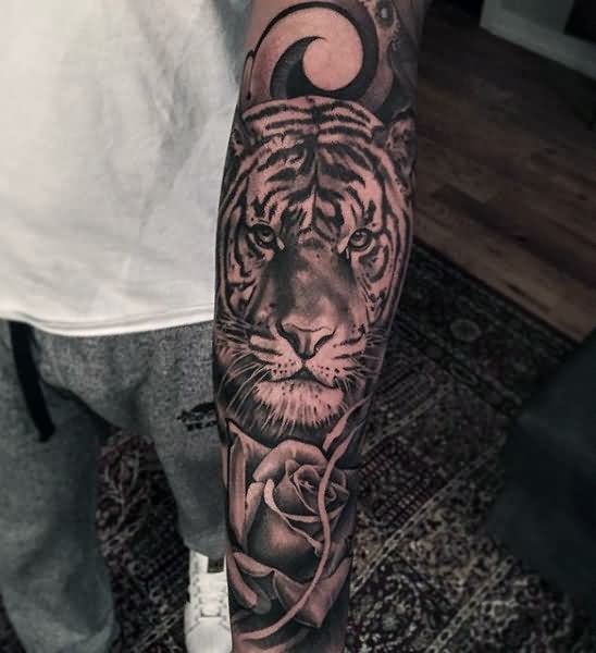 Realistic Rose Flower And Tiger Tattoo On Forearm