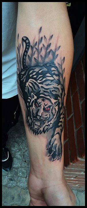Red Eyes Black And Grey Tiger Tattoo On Left Forearm