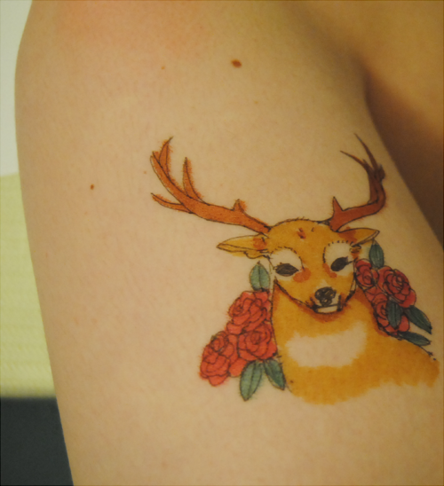 Red Roses And Cute Yellow Deer Tattoo On Bicep