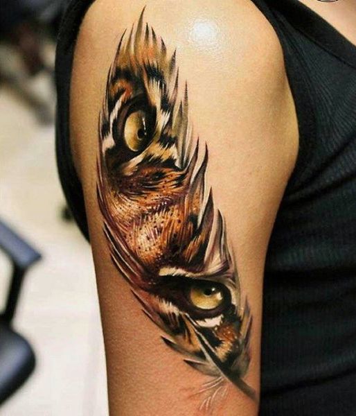 Ripped Skin Tiger Eyes Tattoo On Right Bicep