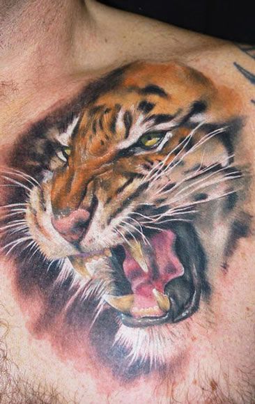 Roaring Tiger Face Tattoo On Chest