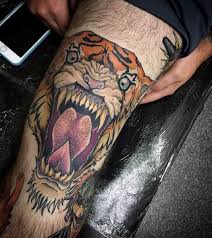 Roaring Tiger Head Tattoo On Left Thigh