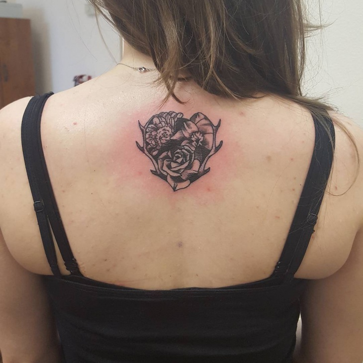 Rose Flower And Deer Antler Tattoo On Upper Back