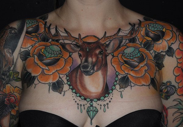 Rose Flowers And Deer Head Tattoo On Chest