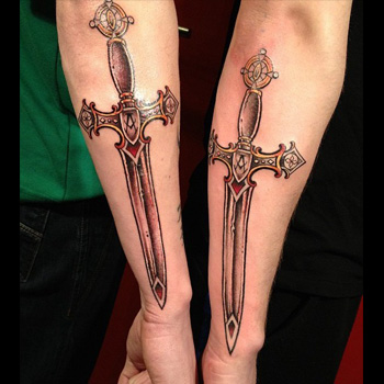 Samurai Sword Tattoo On Couple Right Arm