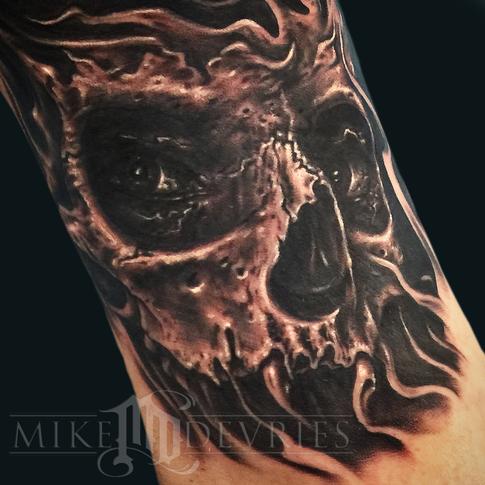 Scary Black Ink Skull Tattoo Design For Men By Mike Devries