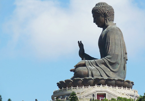 Side View Of Tian Tan Buddha Sitting On Lotus Throne