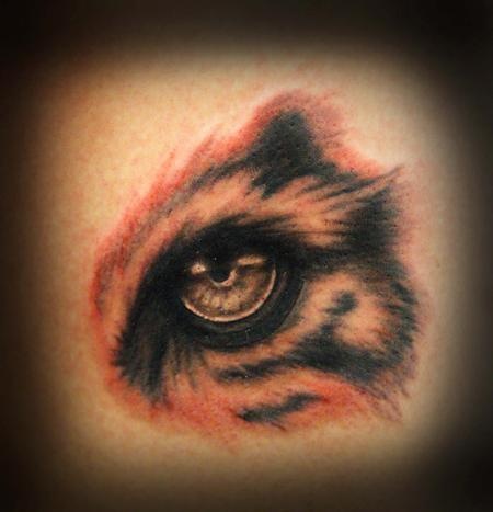 Single Tiger Eye Tattoo Idea