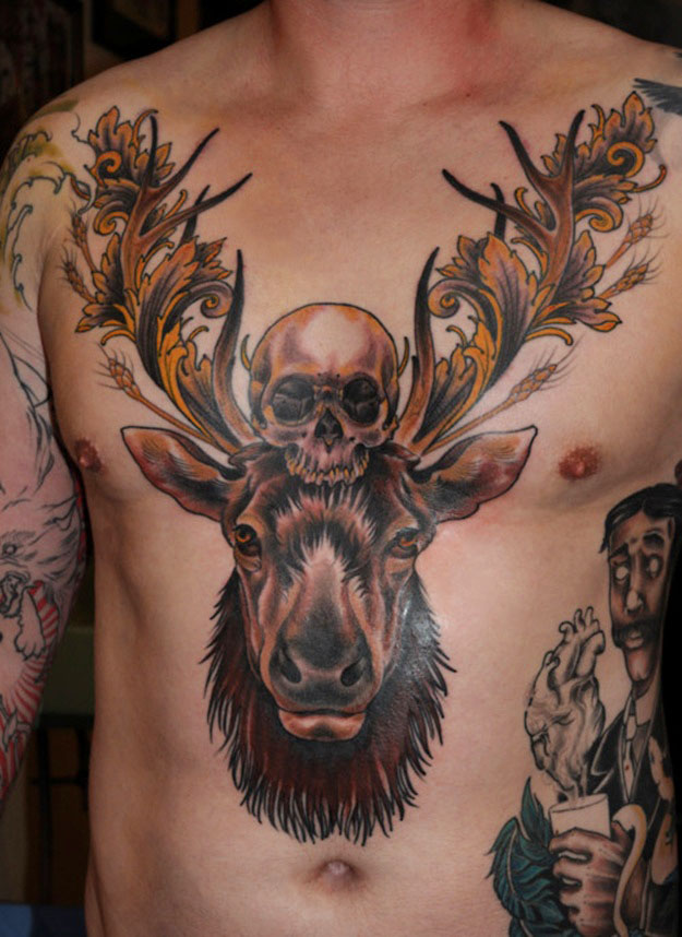 Skull And Deer Head Tattoo On Chest