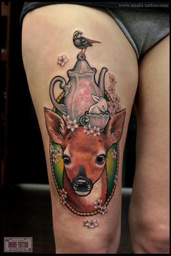 Tea Cattle And Deer Head Tattoo On Thigh