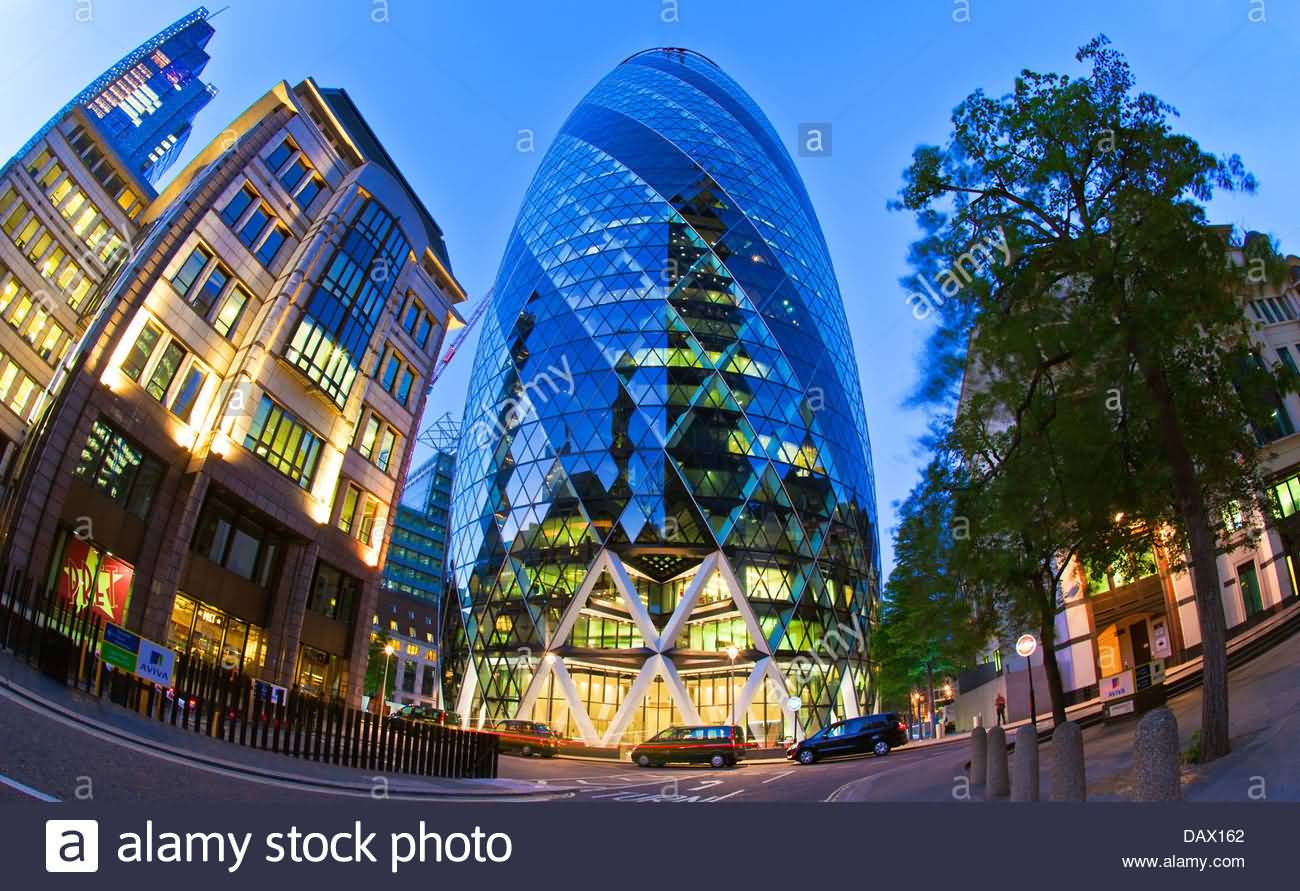 The Gherkin Building Illuminated At Night In London