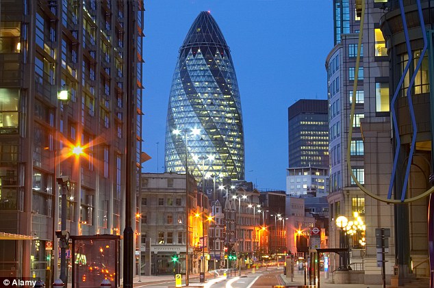 The Gherkin Lit Up At Night In London