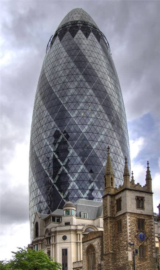 The Gherkin With St. Mary Undershaft Church In London