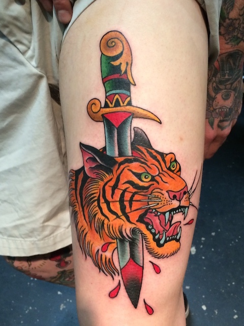 Tiger And Dagger Tattoo On Thigh