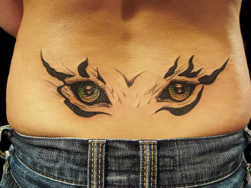 Tiger Eye Tattoo On Lower Back