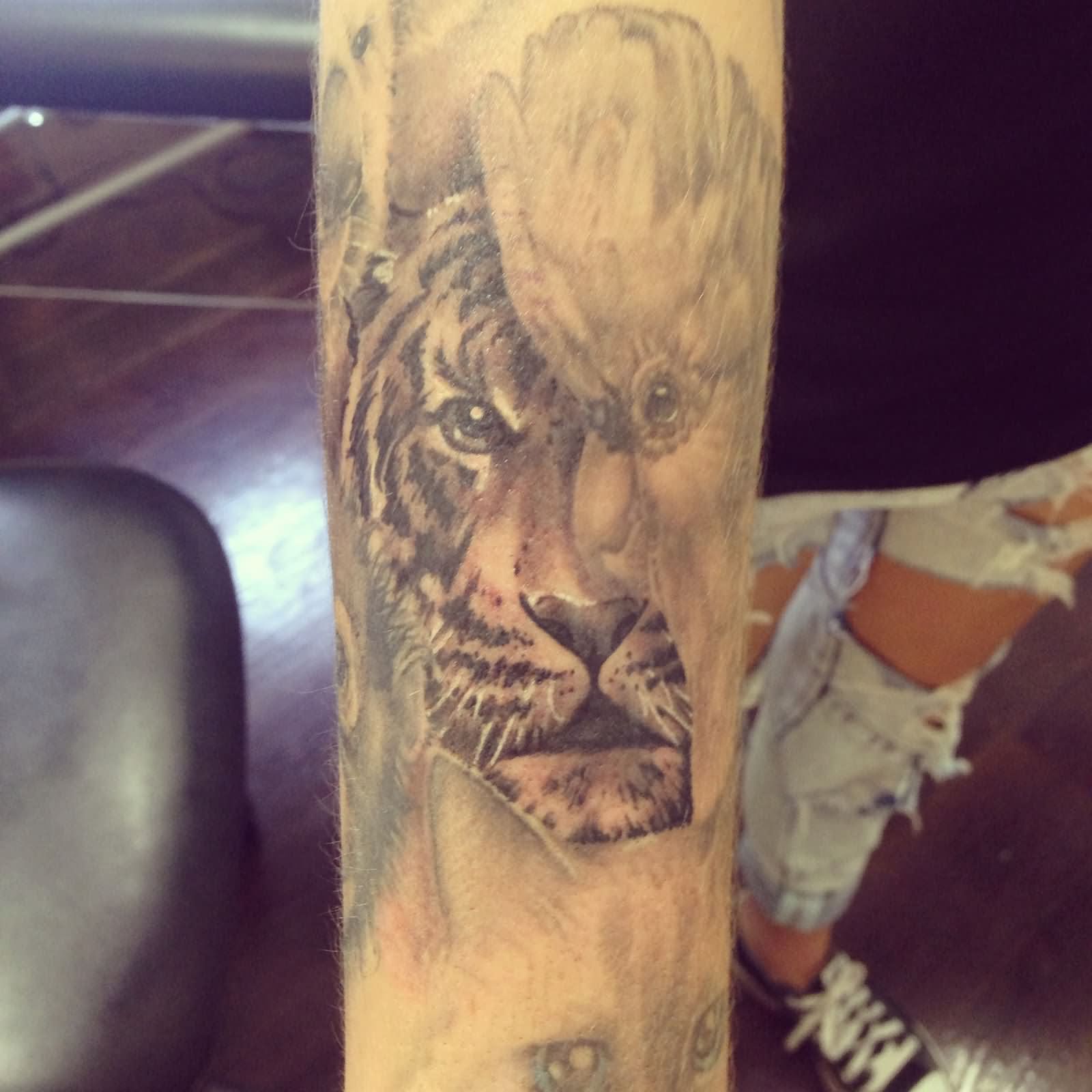 Tiger Face Forearm Tattoo
