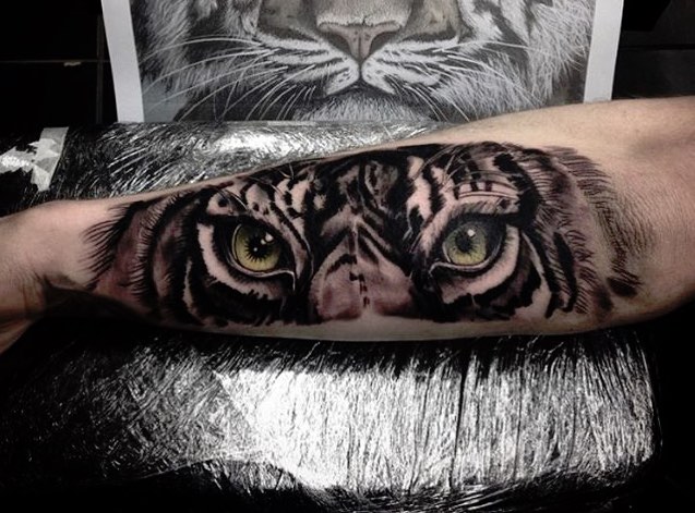 Tiger Face Tattoo On Left Forearm