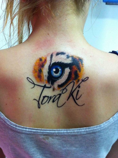 Tora Ki Tiger Eye Tattoo On Upper Back