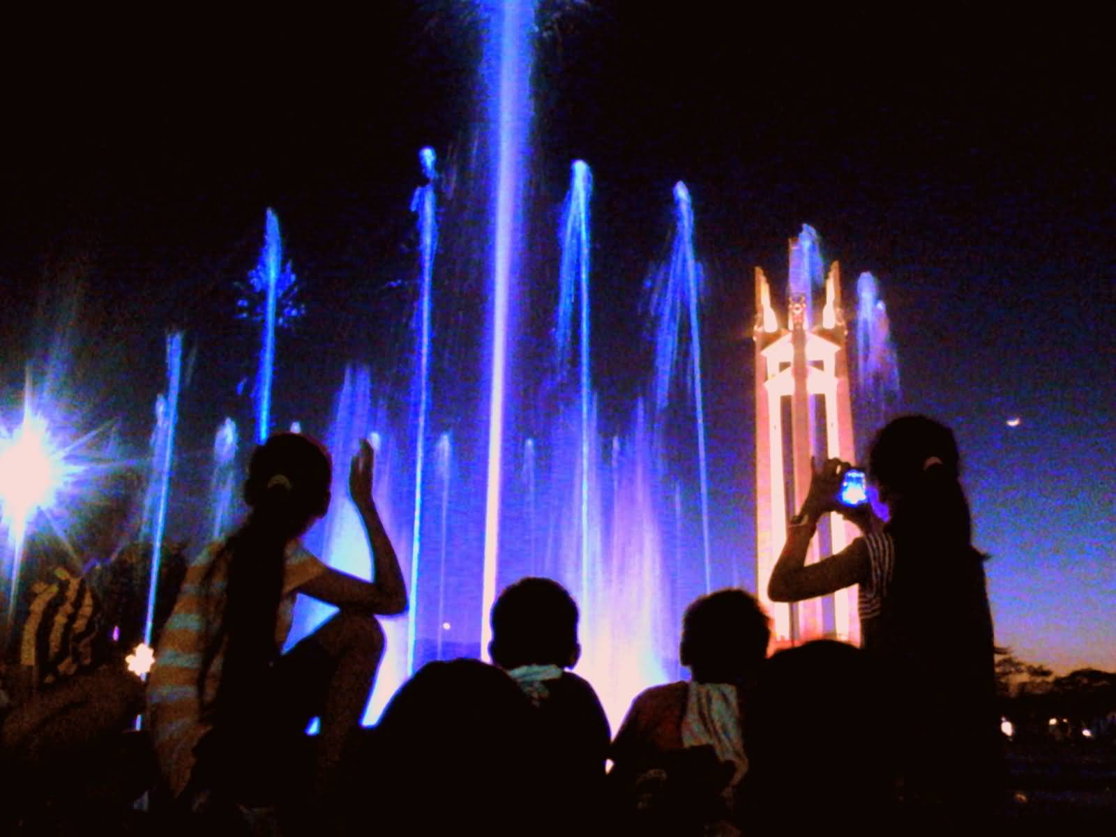 Tourists Enjoy The Night View Of Quezon Memorial Shrine And Fountains Show