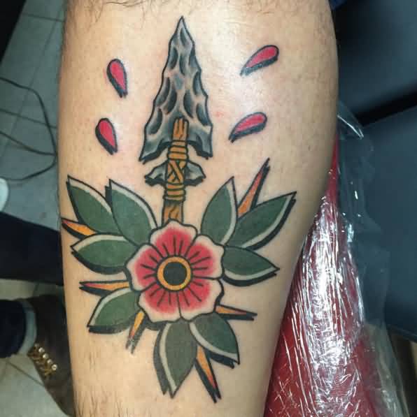 Traditional Arrow In Flower Tattoo On Forearm