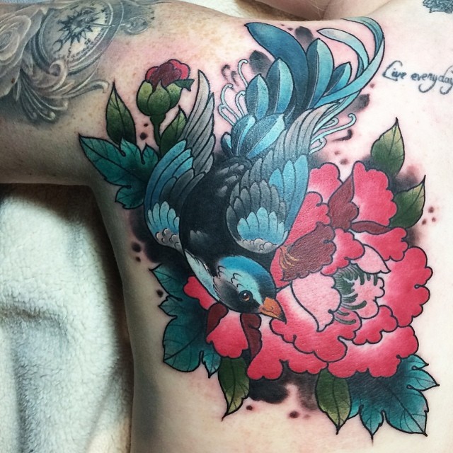 Traditional Bird With Flower Tattoo On Man Left Back Shoulder By Kitty Dearest