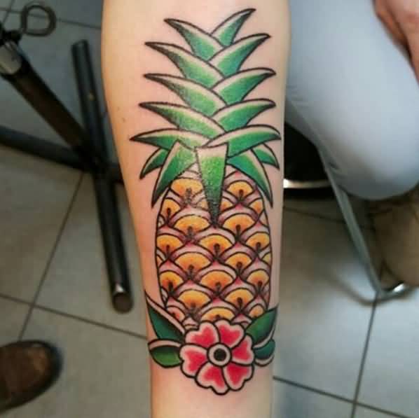 Traditional Flower With Pineapple Tattoo On Forearm