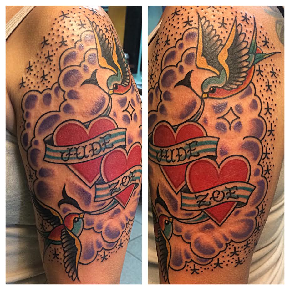 Traditional Hearts With Flying Birds And Banner Tattoo On Man Left Half Sleeve By Justin Brooks