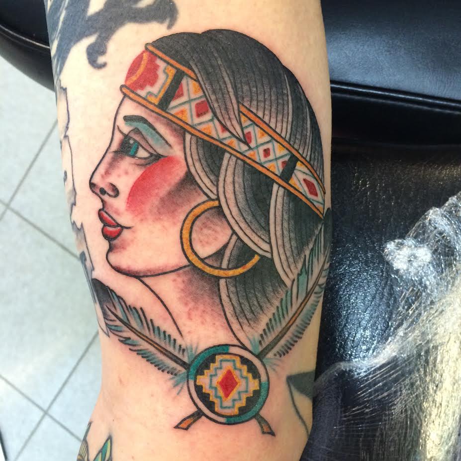 Traditional Native Girl Face Tattoo On Half Sleeve