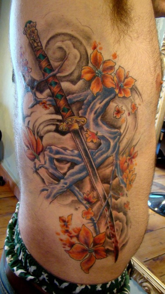 Traditional Samurai Sword Tattoo On Man Right Side Rib