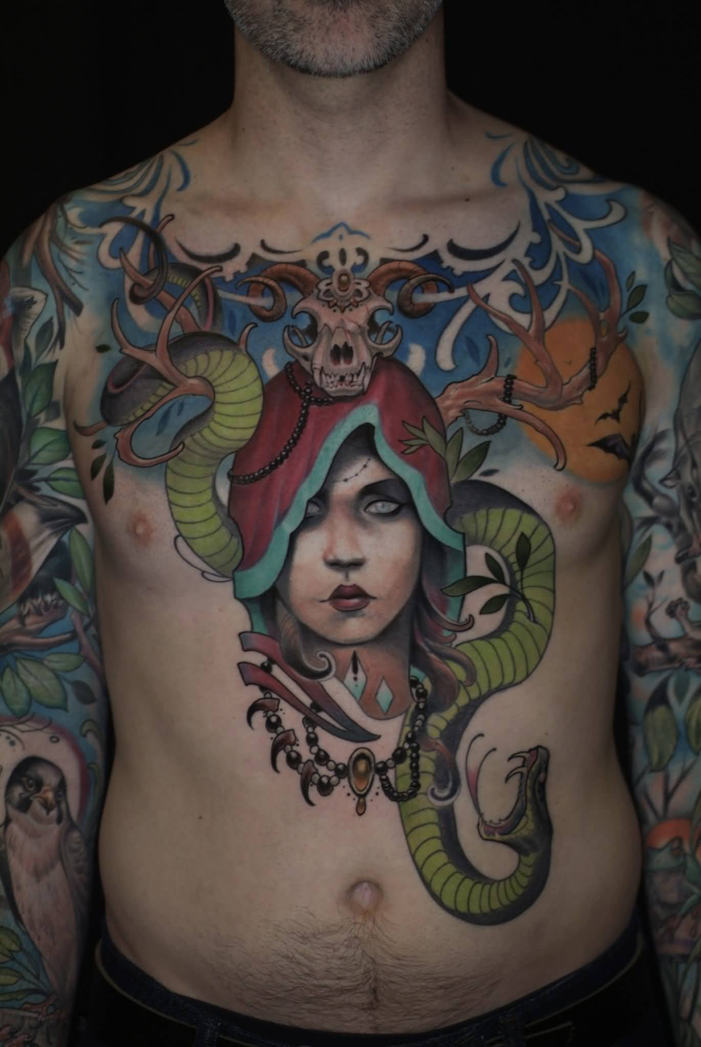 Traditional Women Face With Snake Tattoo On Man Chest By Curtis Burgess