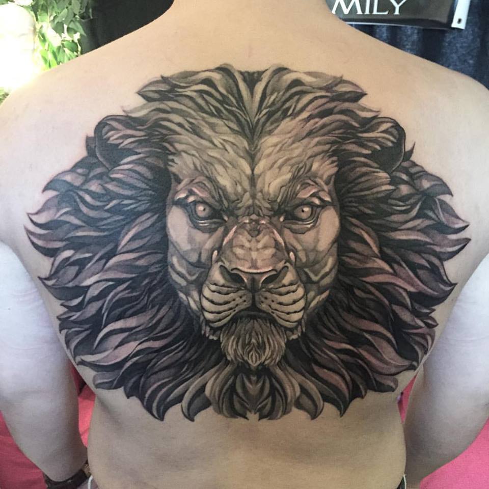 Unique Black Ink Lion Head Tattoo On Man Upper Back By Elvin