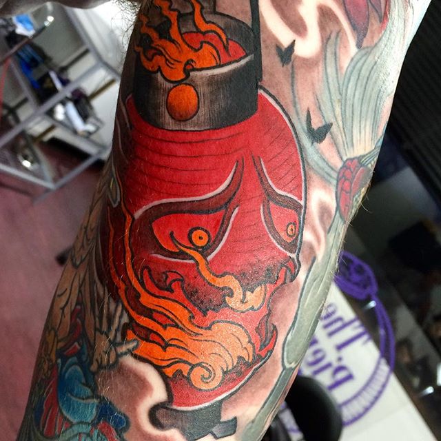 Unique Red Ink Flaming Skull Tattoo Design For Sleeve