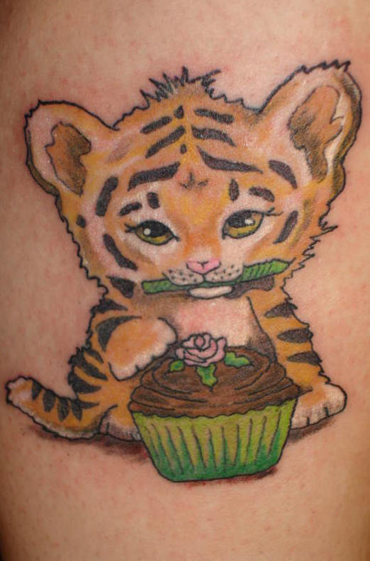Very Cute Baby Tiger With Cupcake Tattoo